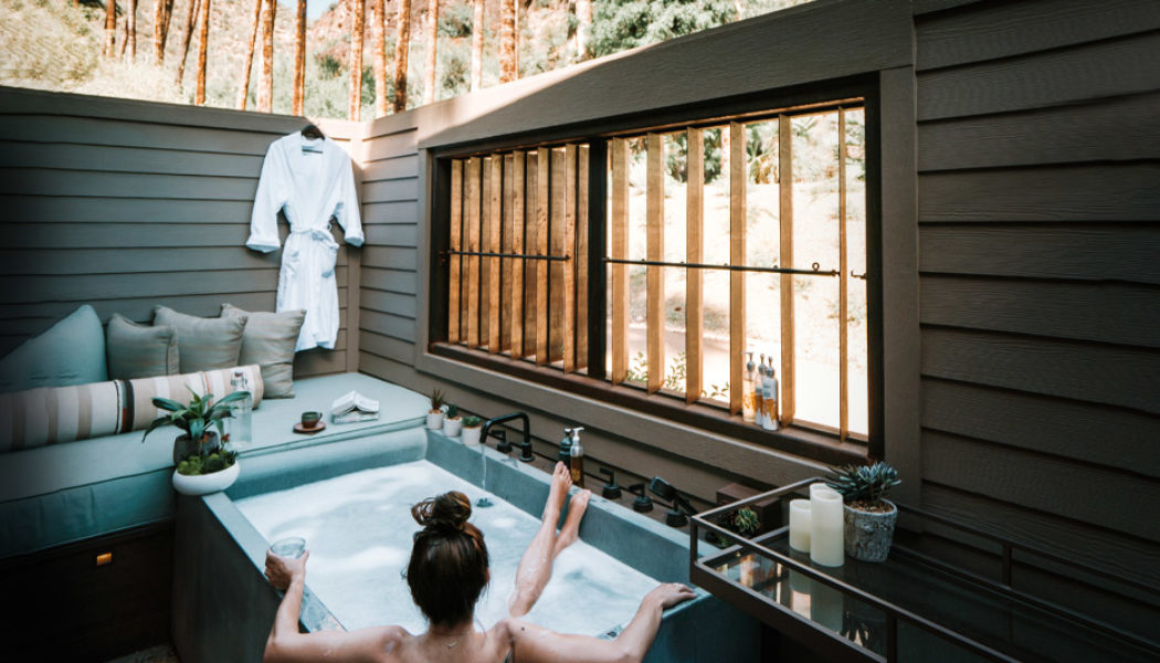 woman in a freshly remodeled bathroom villa
