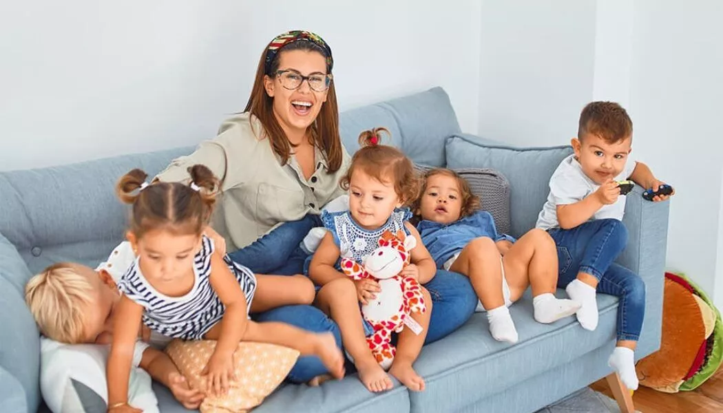 family on the coach in a living room