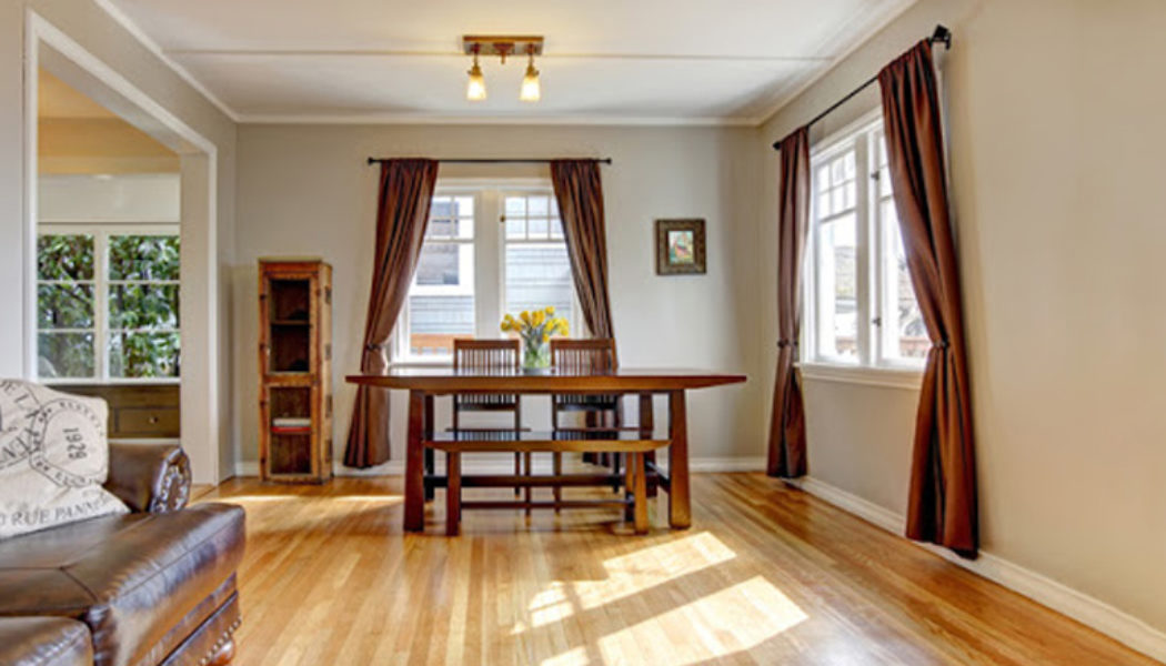 maple hardwood flooring in a large dining room