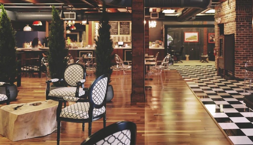 restaurant with hardwood flooring and tile