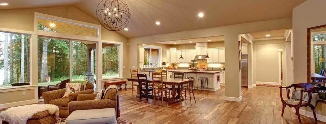 a picture of hardwood floors installed in a huge home
