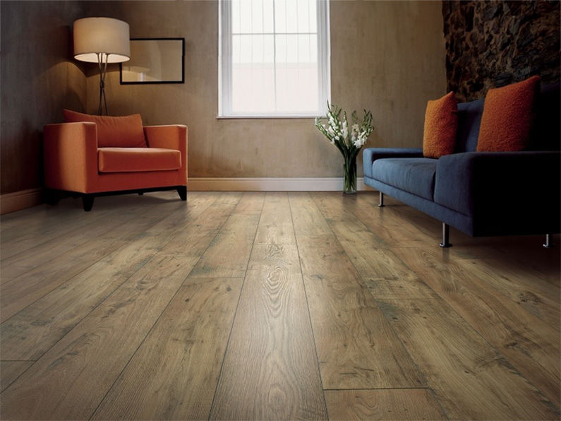 wide plank floors on display in a dark living room