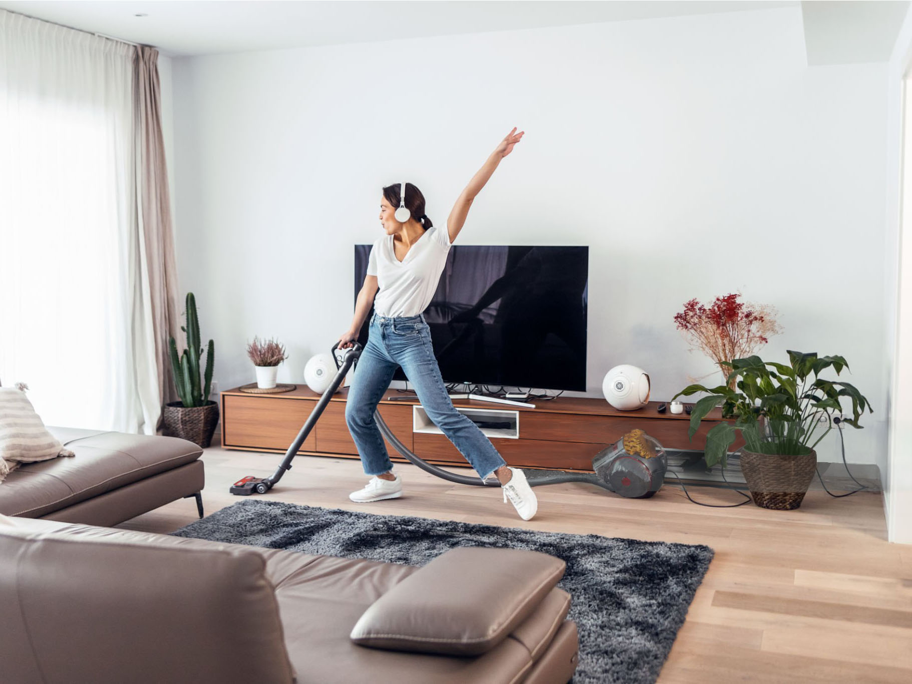 young woman excited using the best cleaner ever