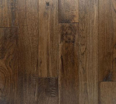 dark hand scraped hickory flooring close up photo
